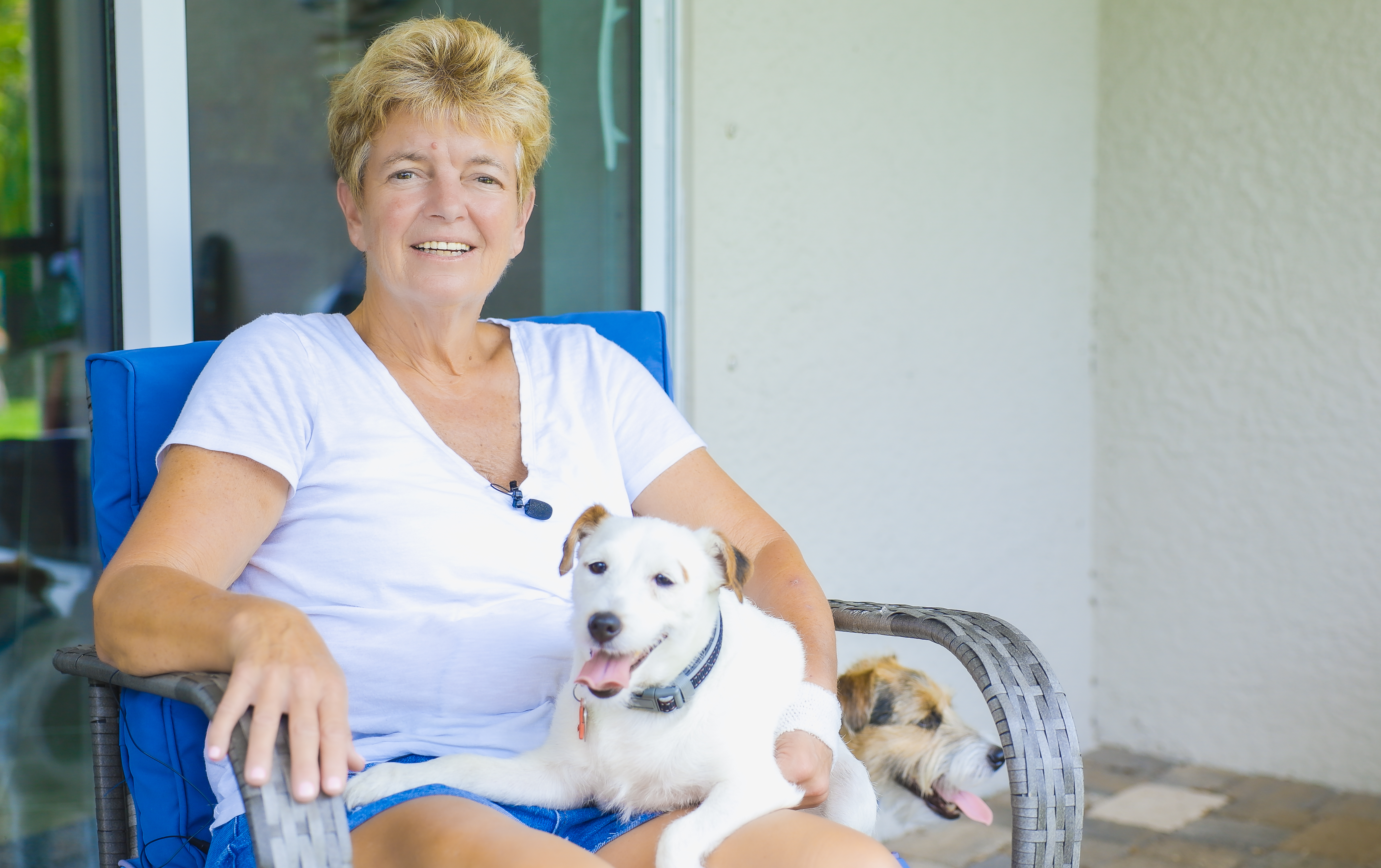 Happy dog owner with pets