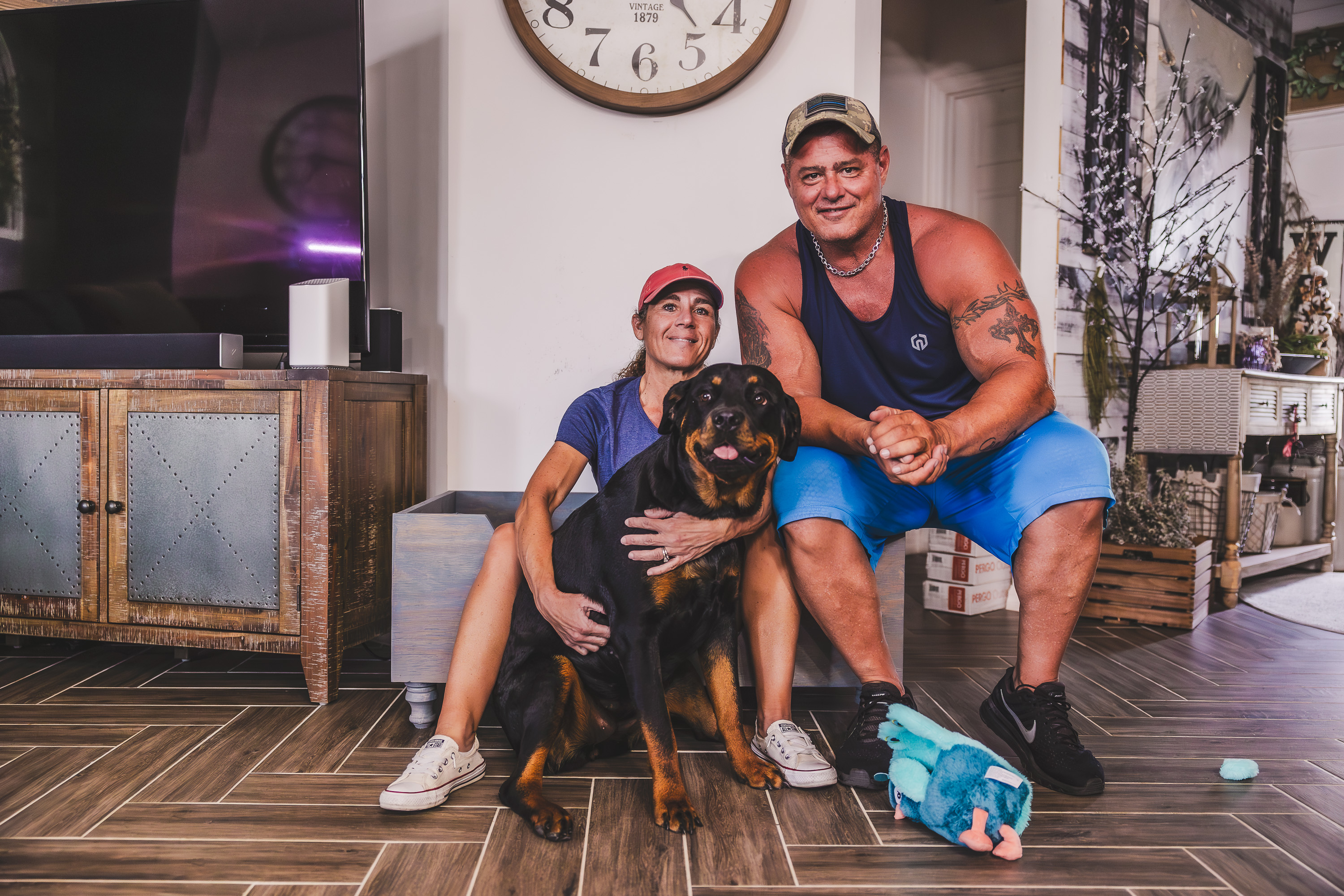 Happy Couple with Protected Rottweiler
